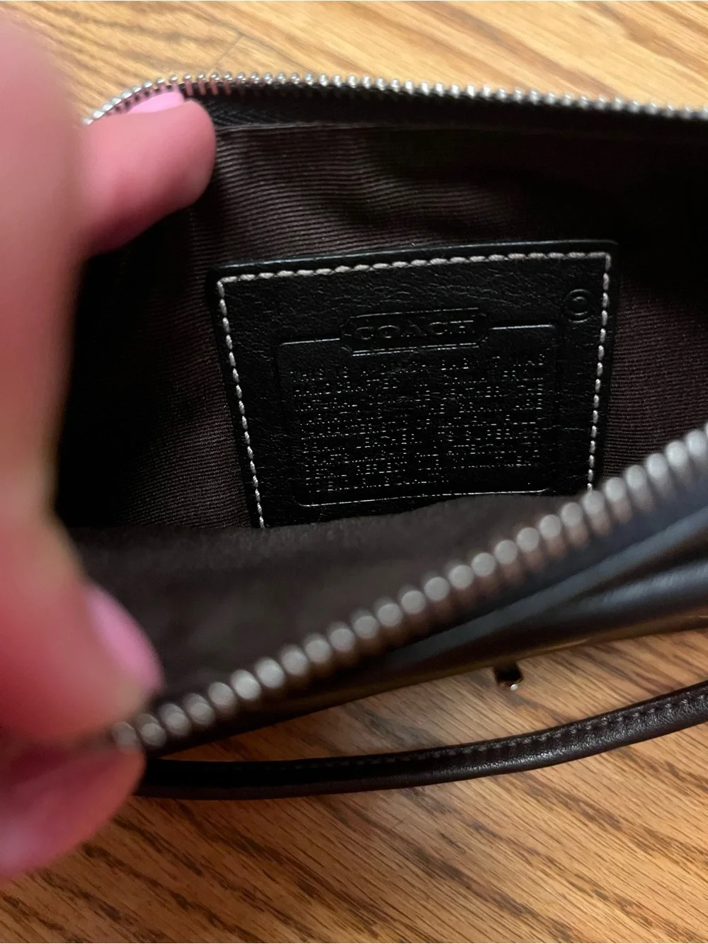Coach sleek black